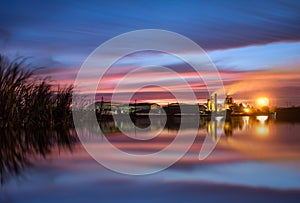 long exposure landscape sunrise sugar factory Smokestack in fact