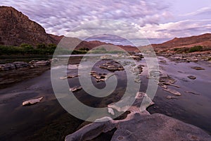 A long exposure landscape taken after sunset on the Orange River