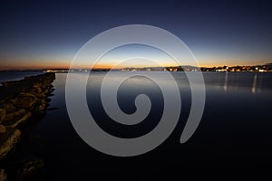 Long exposure of a late sunset sky view over a calm sea