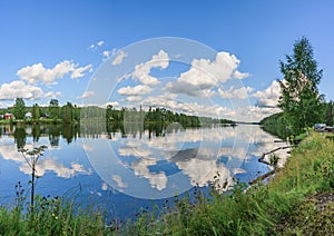 Long Exposure of Magnificent Soft and colorful sunnyday by the river. Beautiful cloud movement water reflection