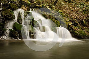 Long exposure of Mells Iron Works Waterfall in Somerset, England