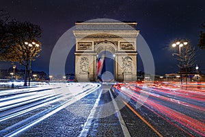 Long exposure of Paris, Champs Ãâ°lysÃÂ©es avenue at night photo