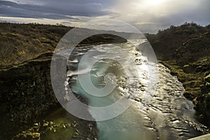 Long exposure photography of the river behind Bruarfoss waterfall