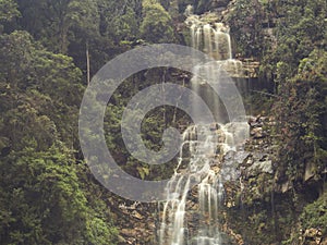 Long exposure photography of a waterfall at the side of the road 2