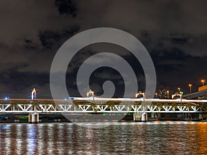 Long exposure picture of a train on a bridge over Sumida River, Asakusa, Tokyo, Japan.