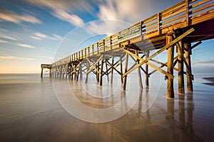 Long exposure of the pier at Isle of Palms at sunrise, near Charleston, South Carolina photo