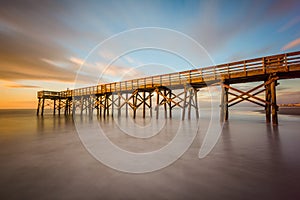 Long exposure of the pier at Isle of Palms at sunrise, near Charleston, South Carolina photo
