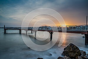 Long exposure of a pier at sunset