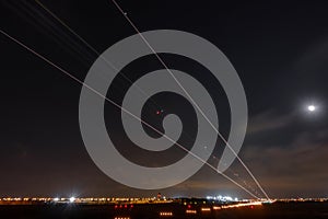 Long exposure of plane lights landing into the airport