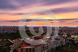 long exposure of residential area in chinese suburb in sunset time