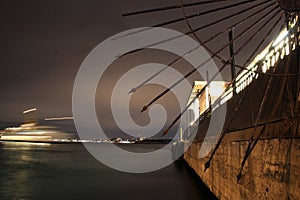 Long exposure sea behind iron spikes