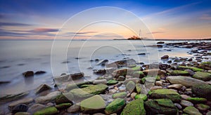 Long exposure of the sea and rocks surrounding St.Mary`s Lighthouse