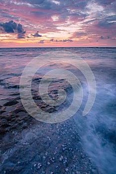 Long exposure sea and rocks at twilight