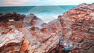 Long Exposure Of Sea With Smooth Wave And Rock. nature of Seascape