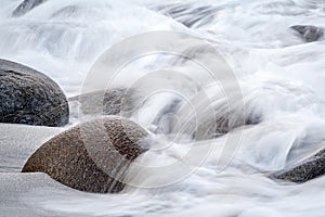 Long exposure of sea and stones