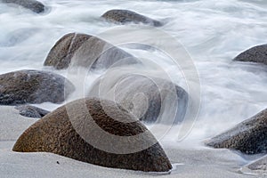 Long exposure of sea and stones on the beach