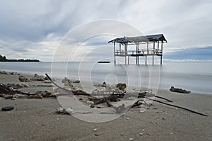 Long Exposure Seascape at old wooden hut photo