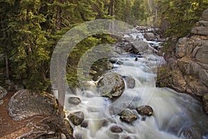 Long exposure shot of a cascade stream in Yellowston photo