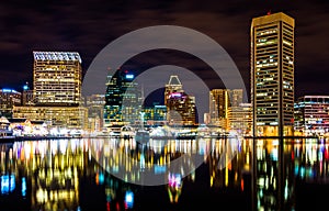 Long exposure of the skyline at night, from the Inner Harbor in