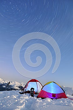Long Exposure Star Trails and tents photo