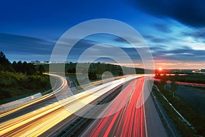 Long-exposure sunset over a highway