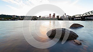 Long exposure time lapse of sunset over city of Porltand Oregon along Willamette River 4k UHD