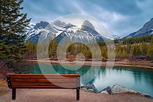 Bench Overlooking Canmore Mountains And River