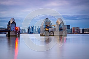 Long exposure view of Canary Wharf and Thames barrier in London