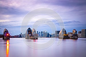 Long exposure view of Canary Wharf and Thames barrier in London