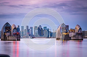 Long exposure view of Canary Wharf and Thames barrier in London