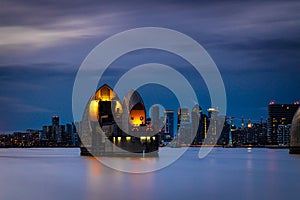 Long exposure view of Canary Wharf and Thames barrier in London