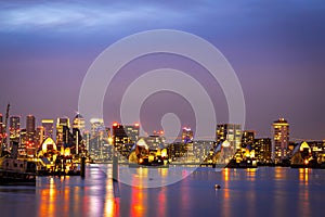 Long exposure view of Canary Wharf and Thames barrier in London