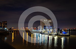 Long exposure view of Canary Wharf and Thames barrier in London