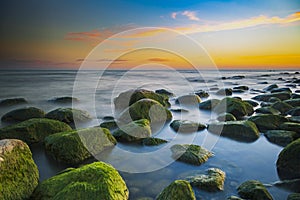 Long exposure view of rocky beach of Lake Ontario