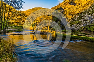 A long exposure view at sunset of the River Dove valley at Dovedale, UK