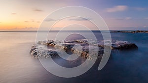 Long exposure waterscape and rock photo