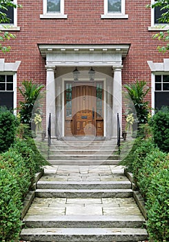 Long flagstone path leading to portico entrance