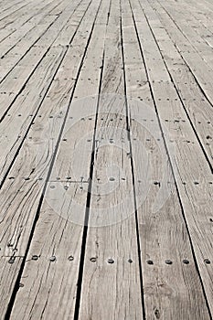 Long flat timbers of a new deck on a working dock on the New Eng