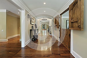 Long foyer with wooden barn doors