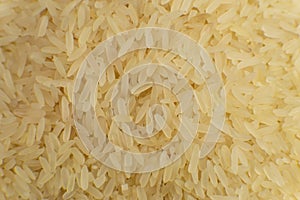 Long grain white rice background. Macro. Rice texture. Top view