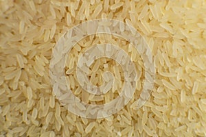 Long grain white rice background. Macro. Rice texture. Top view