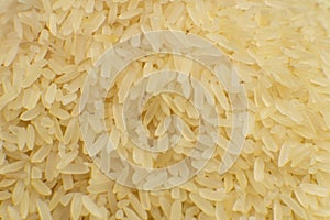 Long grain white rice background. Macro. Rice texture. Top view
