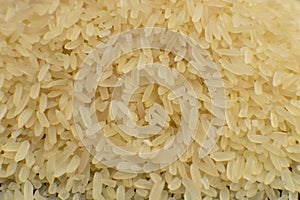 Long grain white rice background. Macro. Rice texture. Top view