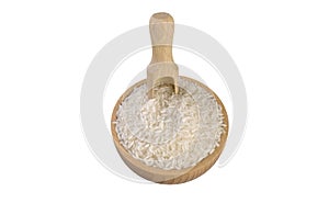 Long grain white rice   in wooden bowl and scoop isolated on white background. nutrition. bio. natural food ingredient