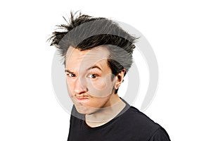 Long hair guy offended and matures on a white isolated background