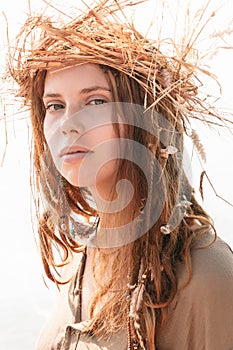 Long Hair Woman in Boho Fashion with Crown of Hay