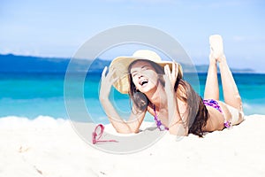 Long haired girl in bikini on tropical bali beach