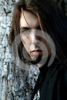 A long-haired young man