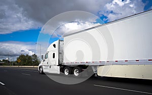 Long haul big rig semi truck transporting commercial cargo in dr