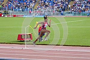 Athlete running to the takeoff board